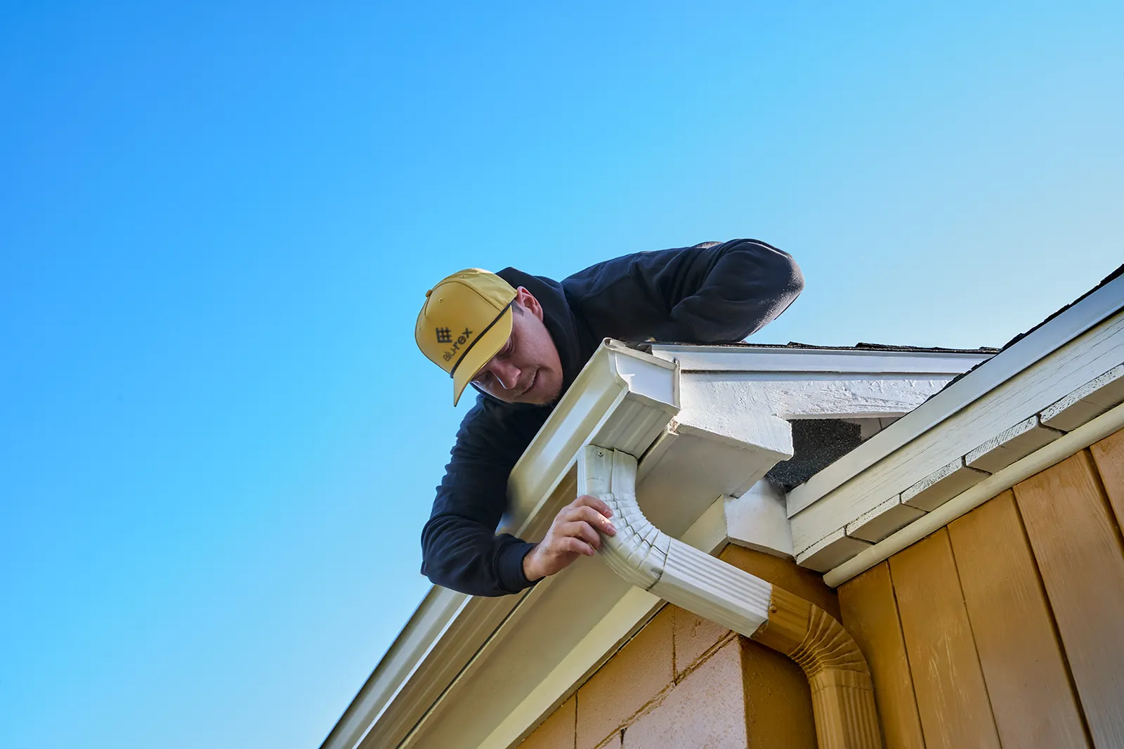 Downspout elbow adjustment — Top Quality Construction LLC, Rice Lake WI